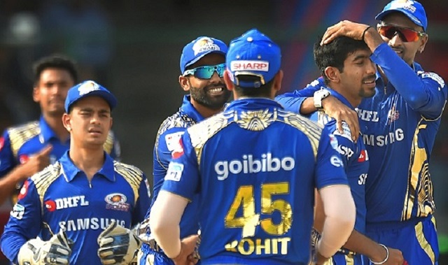 New Delhi: Mumbai Indians bowler J Bumrah with captain Rohit Sharma and teammates celebrate the wicket of Delhi Daredevils batsman Glen Maxwell during an IPL 2018 match in New Delhi on Sunday. (PTI Photo/Kamal Kishore)
(PTI5_20_2018_000082B)